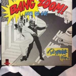 Photo detail:VINYL RECORD - THE REAL ROXANNE W/HITMAN HOWIE TEE - BANG ZOOM! (LET'S GO-GO) - HOWIE'S TEED OFF