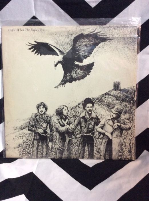 product details: VINYL RECORD - TRAFFIC - WHEN THE EAGLE FLIES photo