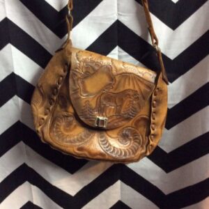 Photo detail:LEATHER HANDBAG - HAND TOOLED