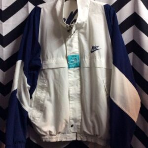 Photo detail:NIKE WINDBREAKER JACKET W/CHALLENGE COURT PATCH