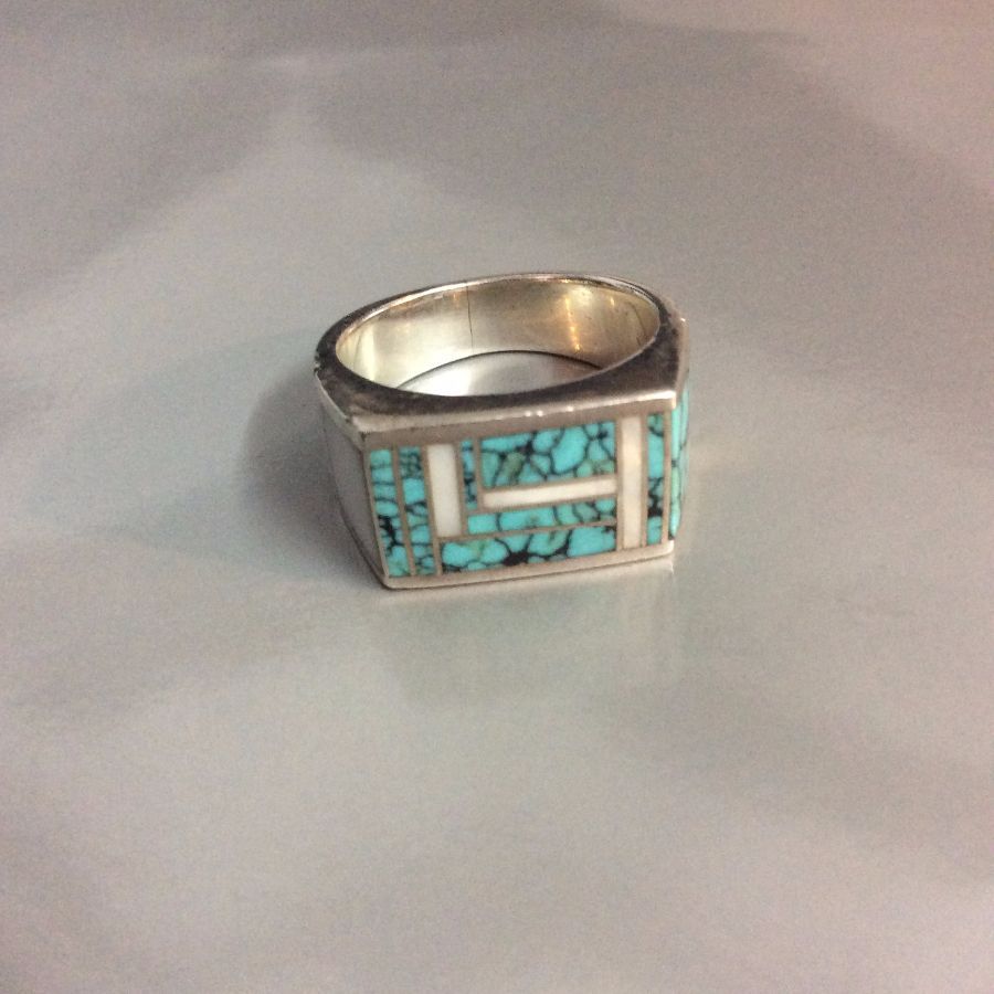 Inlayed polished turquoise Ring Structured setting Signed K 1