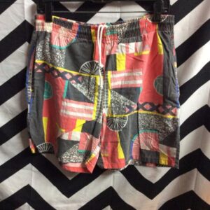 Photo detail:1990'S BEACH SHORTS - DRAWSTRING WAIST - GEOMETRIC VOLLEYBALL PRINT