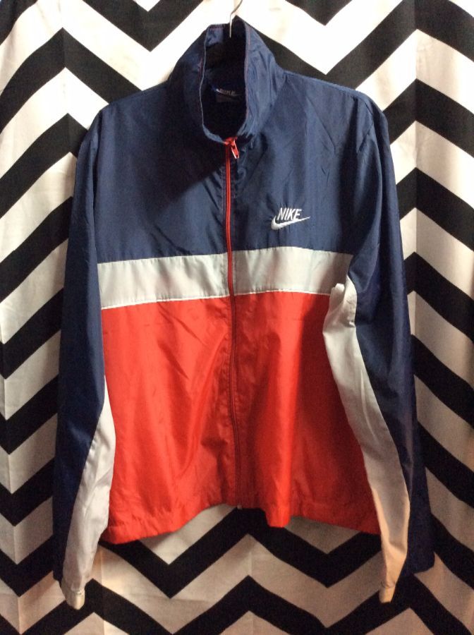 red and navy blue nike windbreaker