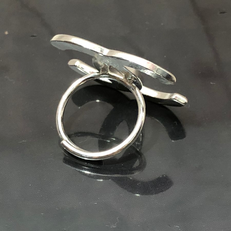 CHANEL STERLING SILVER RING, of chunky design and stamped 'CHANEL' to top,  weight gross 17grams, marked 925 and Chanel lozenge mark/stamp to bank of  shank.