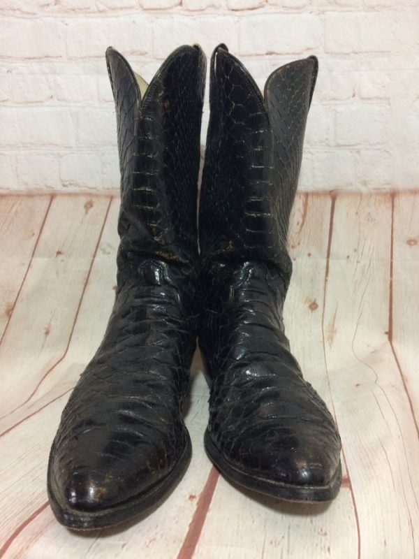 snake skin pointed toe boots