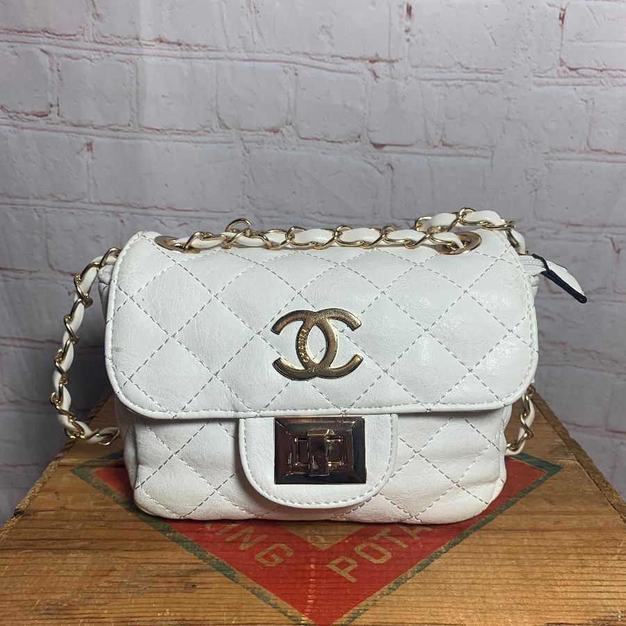 Lauren Goodger accused of flogging a fake Chanel bag after doctoring  description  Mirror Online