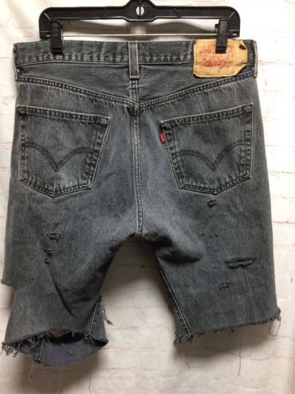 black ripped levis