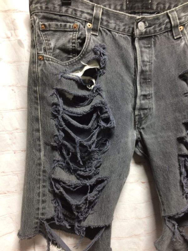 black ripped levis