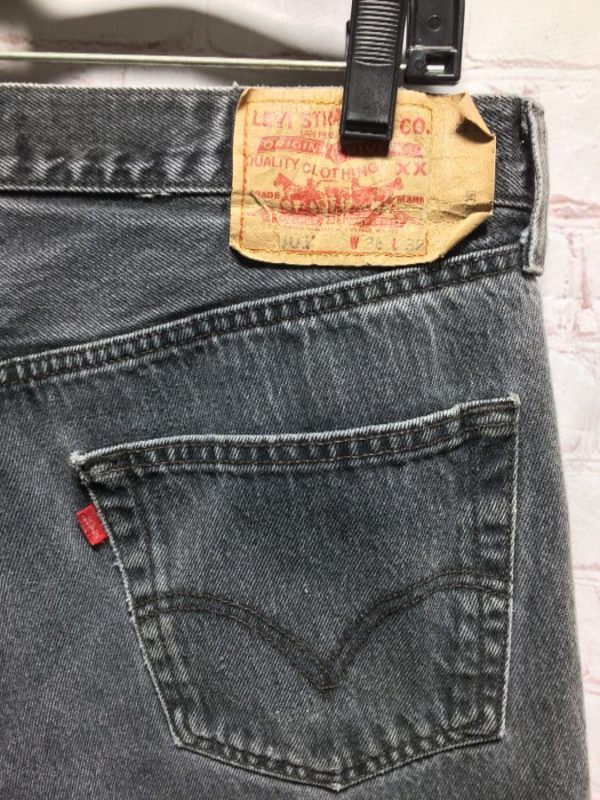 black ripped levis