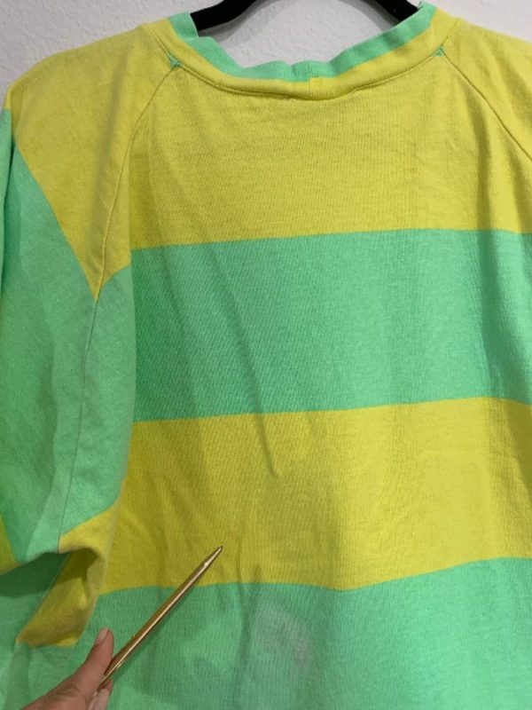 orange and green striped shirt