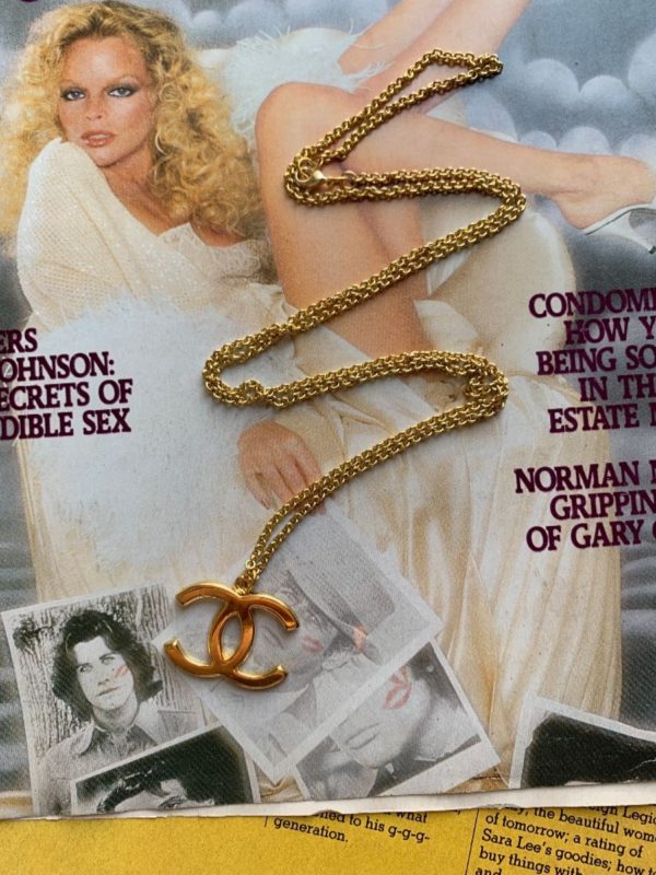 product details: BRASS CHANEL LOGO CHARM ON SMALL CHAIN LINK NECKLACE photo