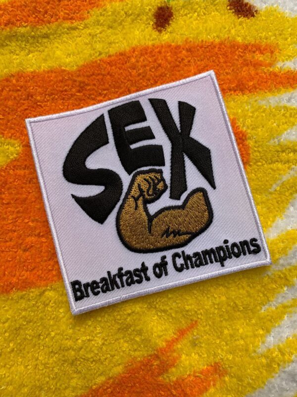 product details: SILLY SQUARE SEX BREAKFAST OF CHAMPIONS IRON-ON OR SEW-ON  PATCH photo