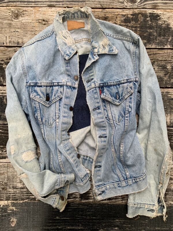 product details: THRASHED & DISTRESSED LEVIS DENIM JACKET SOLD AS IS photo