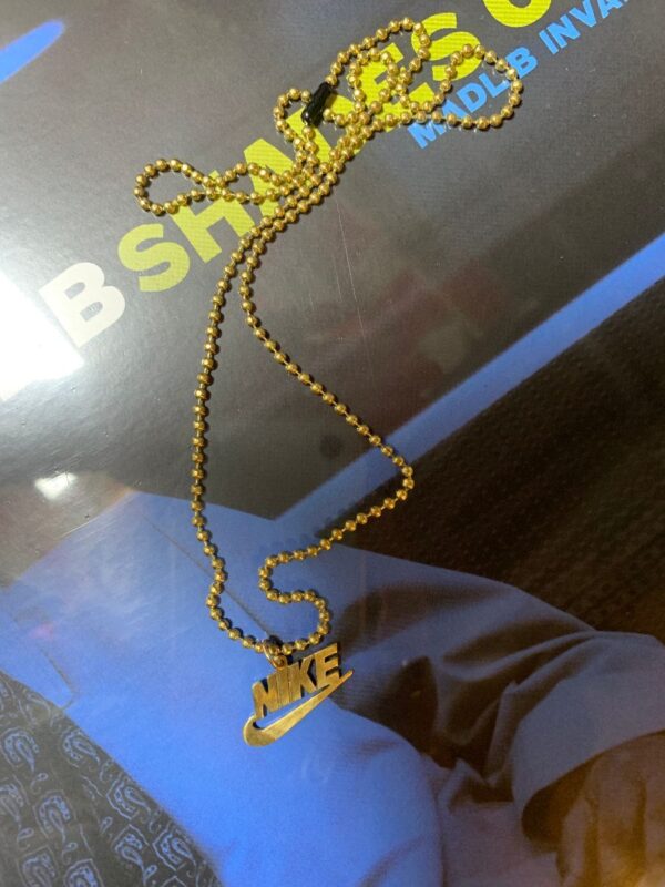 product details: SOLID BRASS BOOT NIKE NECKLACE ON CLASSIC BRASS BALLCHAIN photo