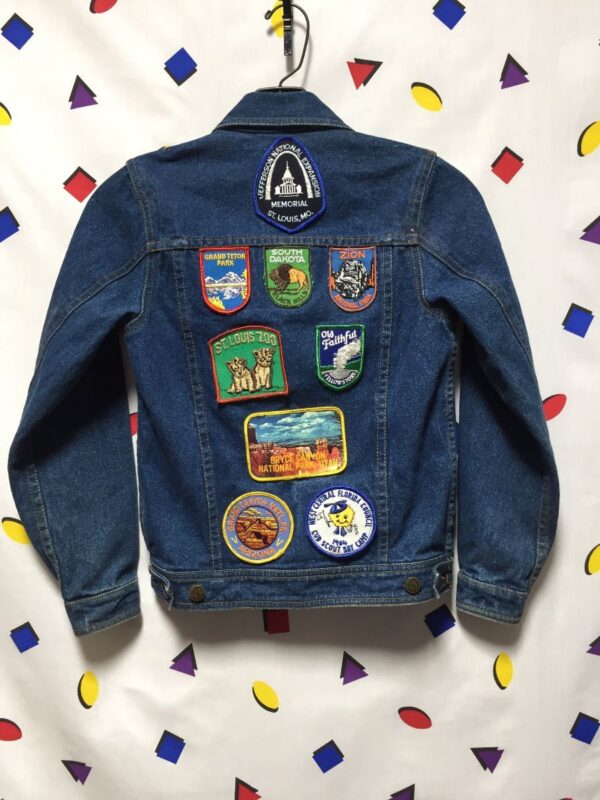product details: KIDS DARK WASH DENIM TRUCKER JACKET WITH PATCHES ON BACK AS - IS photo