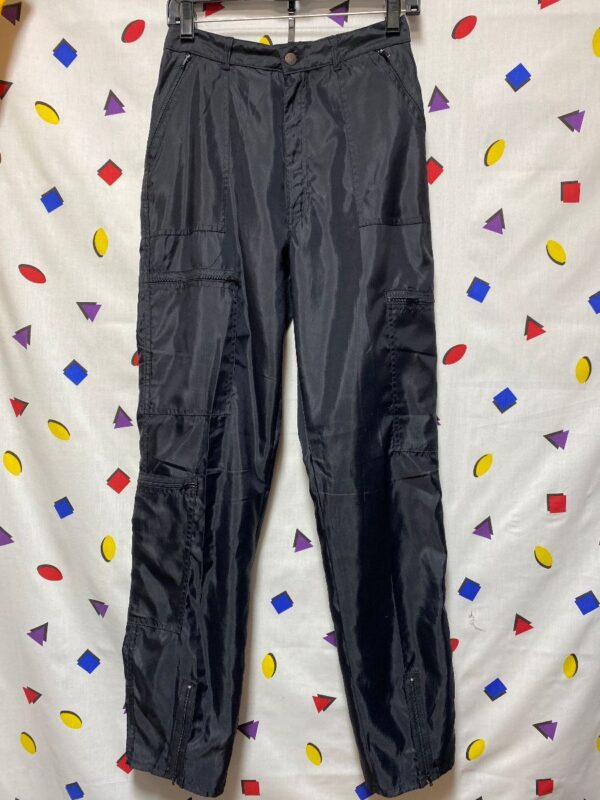 product details: DEADSTOCK HIGH-WAISTED NYLON PARACHUTE PANTS ZIPPER POCKETS AND FRONT ZIP ANKLES photo