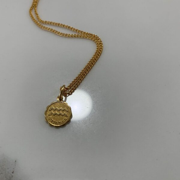 product details: SMALL AQUARIUS ZODIAC SYMBOL NECKLACE WITH GOLD PLATED DEADSTOCK LINK CHAIN photo