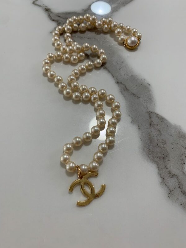 product details: CHANEL LOGO PEARL NECKLACE WITH GOLD ROPED PEARL CLASP photo