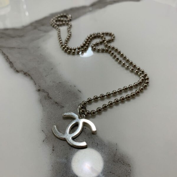 product details: SILVER PLATED CHANEL LOGO PENDANT WITH BALL-LINK CHAIN NECKLACE photo