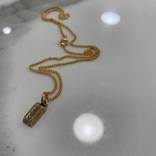 product details: GOLD PLATED NECKLACE TINY GOLD BAR PENDANT photo