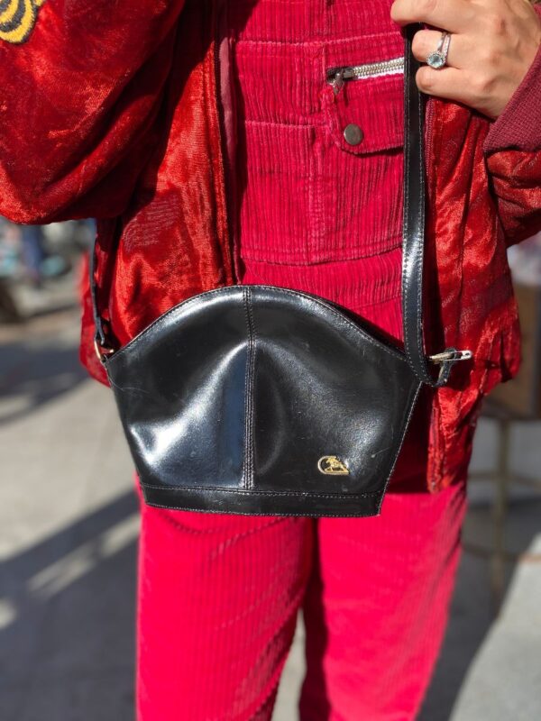 product details: LATE 80S CROSSBODY PURSE WITH ADJUSTABLE STRAP, METAL HORSE LOGO, ROUNDED TOP, AND STRUCTURED BOTTOM MADE IN ITALY photo