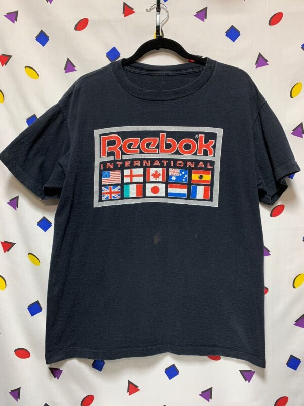 product details: COOL VINTAGE REEBOK INTERNATIONAL FLAGS GRAPHIC TEE AS-IS photo