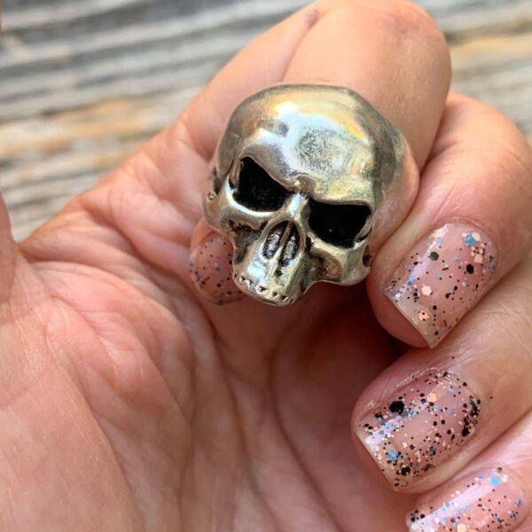 product details: BADASS ANGRY SKULL BROKEN JAW WITH ENAMEL DEATH BLACK EYES BIKER RING photo