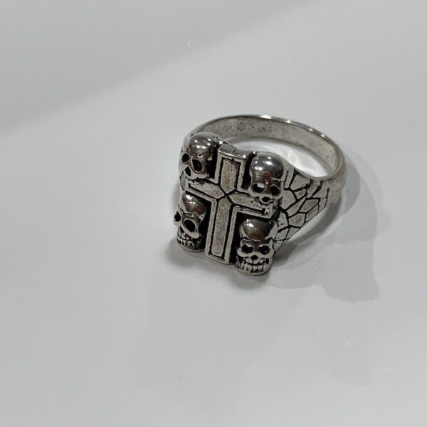 product details: FOUR CORNER SKULLS AND CROSS BIKER RING WITH CRACKED TEXTURE SIDES photo