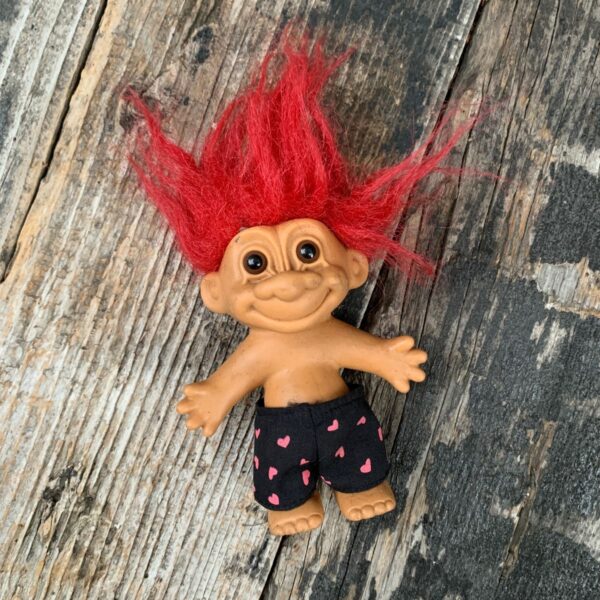 product details: RED HAIR TROLL DOLL WITH HEART SHORTS I LOVE YOUR BUNS photo