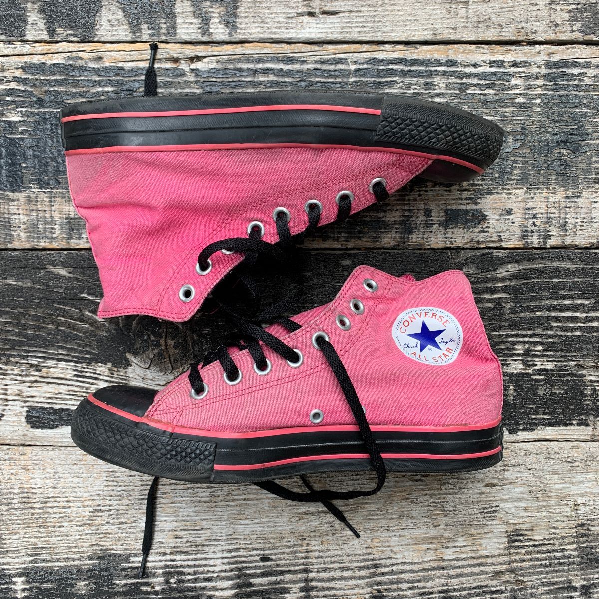 black and pink high tops
