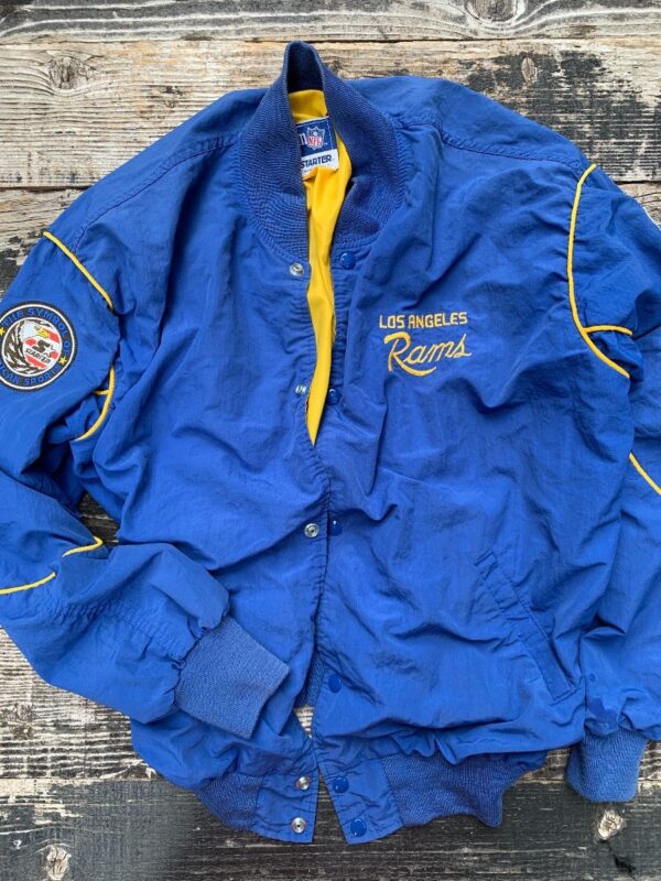 product details: VINTAGE STARTER NFL LA LOS ANGELES RAMS SNAP BUTTON JACKET PATCHES ON SLEEVES photo
