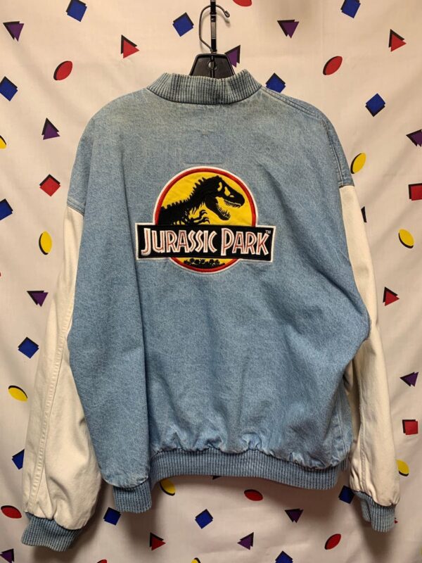 product details: JURASSIC PARK CLASSIC LOGO DENIM JACKET - WHITE SLEEVES - RIBBED COLLAR AND CUFFS - SNAP FRONT CLOSURE - THIN COTTON LINING AS-IS photo