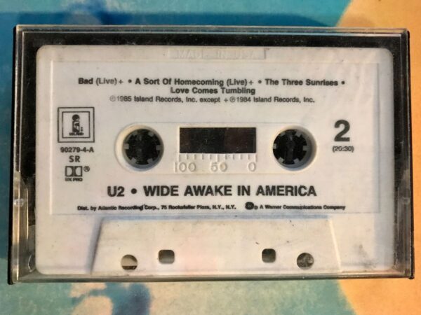product details: VINTAGE CASSETTE TAPE - U2 WIDE AWAKE IN AMERICA 1985 photo