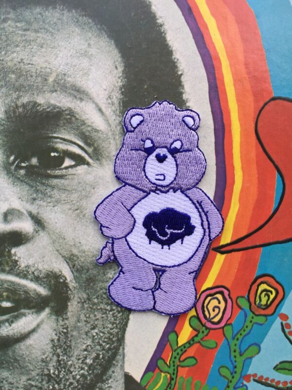 product details: CARE BEARS PURPLE GRUMPY BEAR RAINCLOUD EMBROIDERED PATCH photo