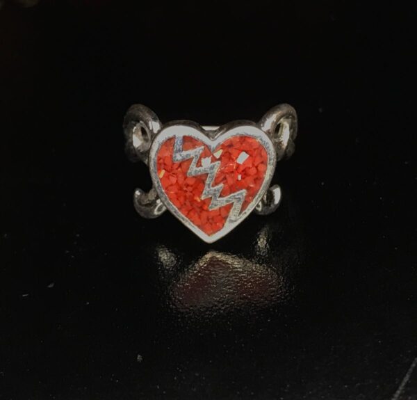 product details: LOVE STINKS BROKEN HEART CRUSHED CORAL RED SILVER RING photo
