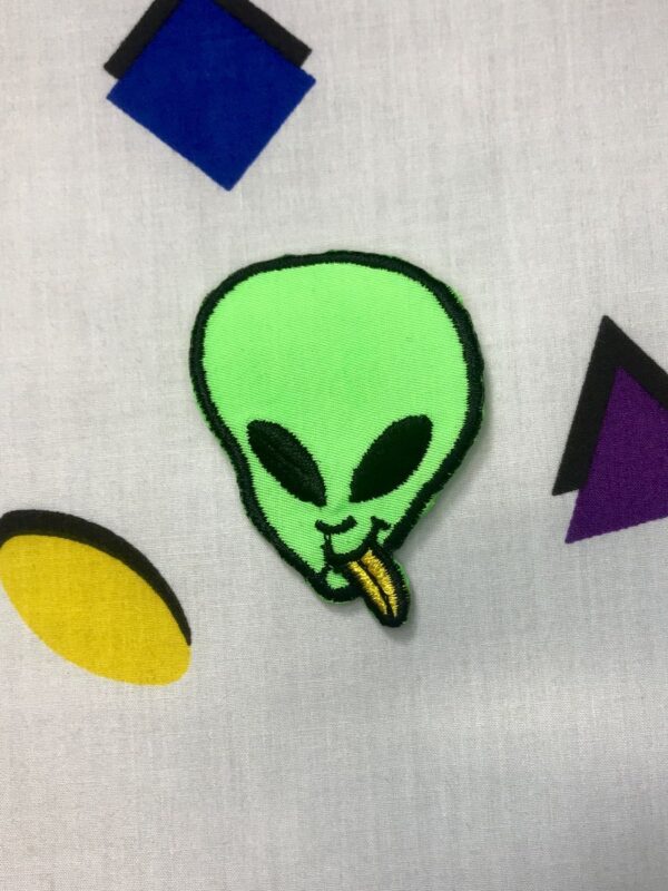 product details: 1990S ALIEN PATCH W/ YELLOW TONGUE photo