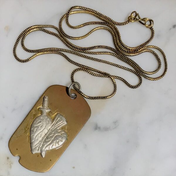 product details: SWORD THROUGH ANATOMICAL HEART GOLD DOG TAG NECKLACE WITH BRASS ROPE CHAIN photo
