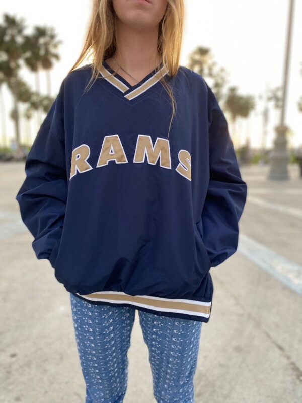 product details: NFL RAMS WINDBREAKER PULLOVER SWEATSHIRT WITH FRONT POCKETS AND BOTTOM SIDE ZIP photo