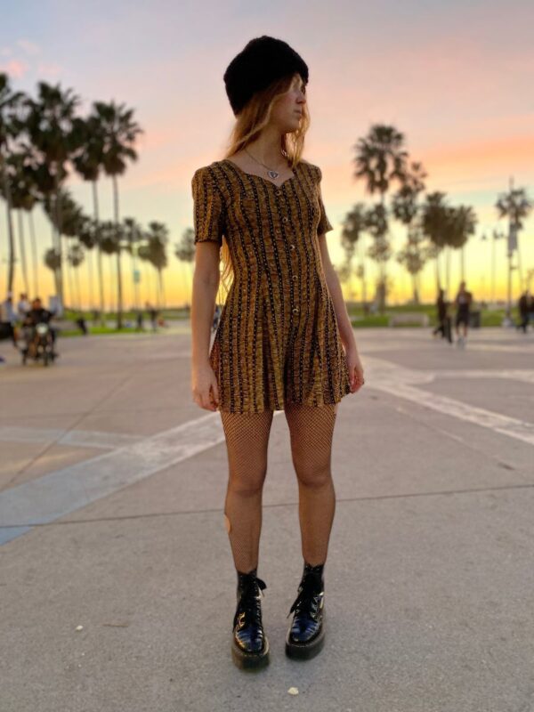 product details: ADORABLE FRONT BUTTON TRIBAL ROMPER WITH CRISS CROSS BACK photo