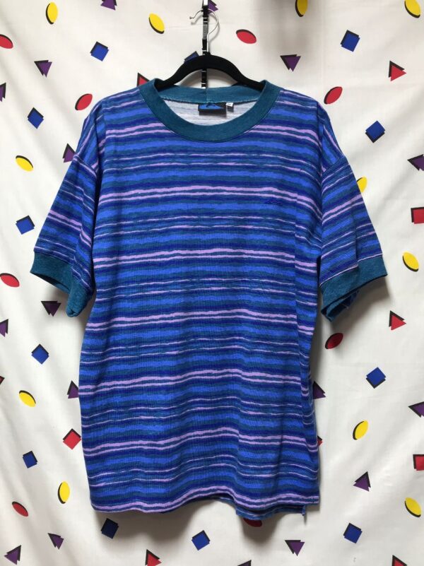 product details: VINTAGE 1990S QUIKSILVER ABSTRACT WAVES HORIZONTAL STRIPED OVERSIZED COTTON T-SHIRT WITH LOGO ON FRONT photo