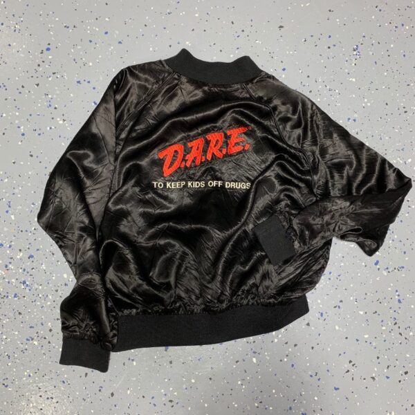 product details: RETRO DARE TO KEEP KIDS OFF DRUGS EMBROIDERED SATIN ZIPUP WINDBREAKER W/ RED INNER LINING photo