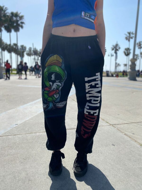 product details: REPURPOSED TEMPLE OWLS SWEATPANTS W/ MARVIN THE MARTIAN SEWN ON PATCH photo