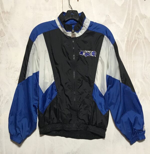 product details: ORLANDO MAGIC FRONT LOGO BACK LETTERING NBA BASKETBALL WINDBREAKER JACKET WITH ZIP FRONT AND DUAL POCKETS photo