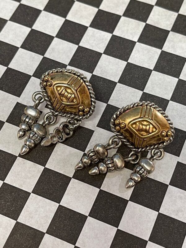 product details: 1990S TWO TONE ROUNDED EMBLEM EARRINGS WITH SILVER DANGLE TRIPLE CONE ACCENTS *DEADSTOCK photo