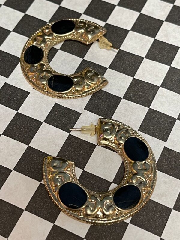 product details: 1980S 3/4 HOOP GOLD ORNATE STAMPED EARRINGS WITH BLACK ENAMEL CIRCLE ACCENTS *DEADSTOCK photo