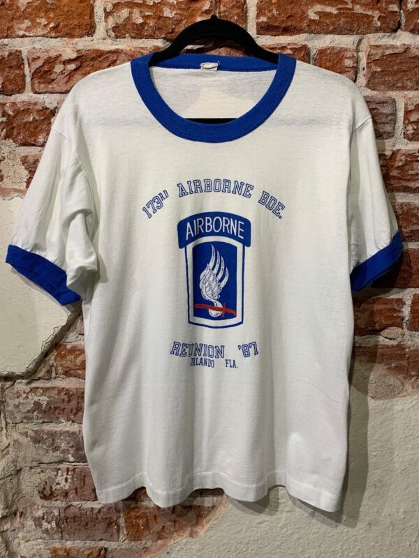 product details: 173RD AIRBORNE BDE. 1987 REUNION GRAPHIC RINGER T-SHIRT photo