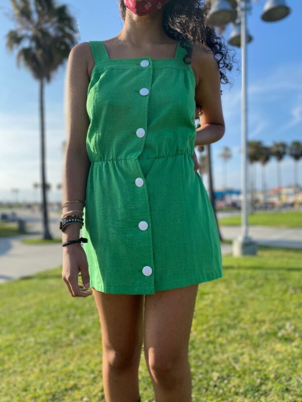 product details: ADORABLE SLEEVELESS MINI DRESS WITH LARGE CENTER BUTTON CLOSURE MADE IN USA photo