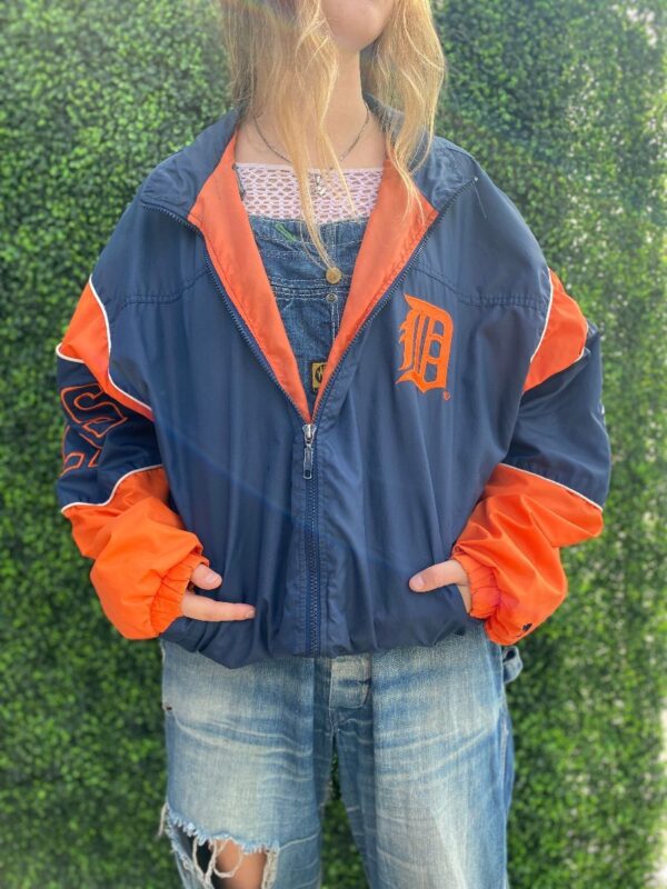 product details: DETROIT TIGERS NYLON COLOR BLOCK WINDBREAKER WITH LARGE D PATCH AND AMERICAN LEAGUE EMBROIDERED PATCH, HIDDEN HOOD photo