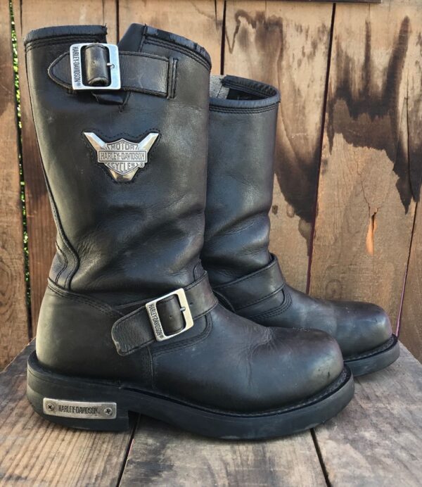 product details: AS-IS LEATHER ROUND STEEL TOE MOTORCYCLE RIDING BOOTS WITH METAL HARLEY EMBLEM OVER-ANKLE STRAP photo
