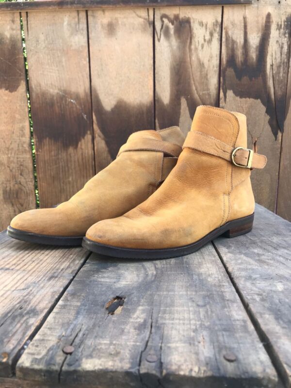 product details: ROUND TOE SLIP ON LEATHER BOOTS WITH WRAP AROUND BOOT STRAPS photo